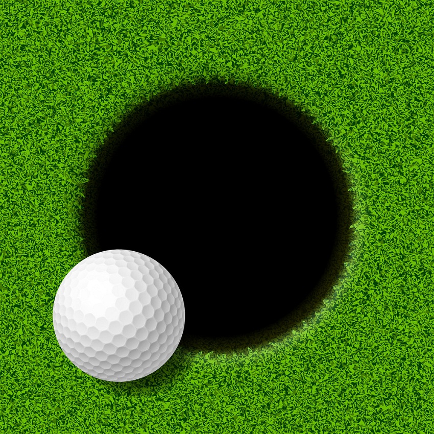 カップの縁にあるゴルフボールのイラスト イラスト